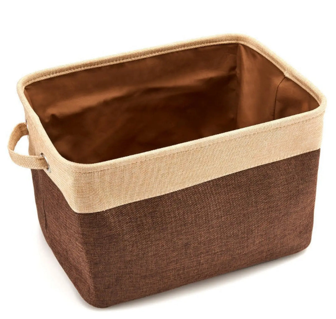 Brown and beige linen storage bin with open top and loop strap side handles