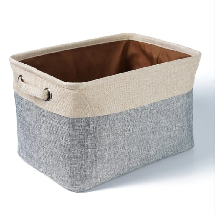 Beige and gray linen storage bin with metal ring side handles for pet supplies