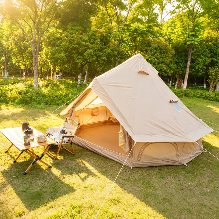 Beige bell tent with side awning open, showing tent interior and seating