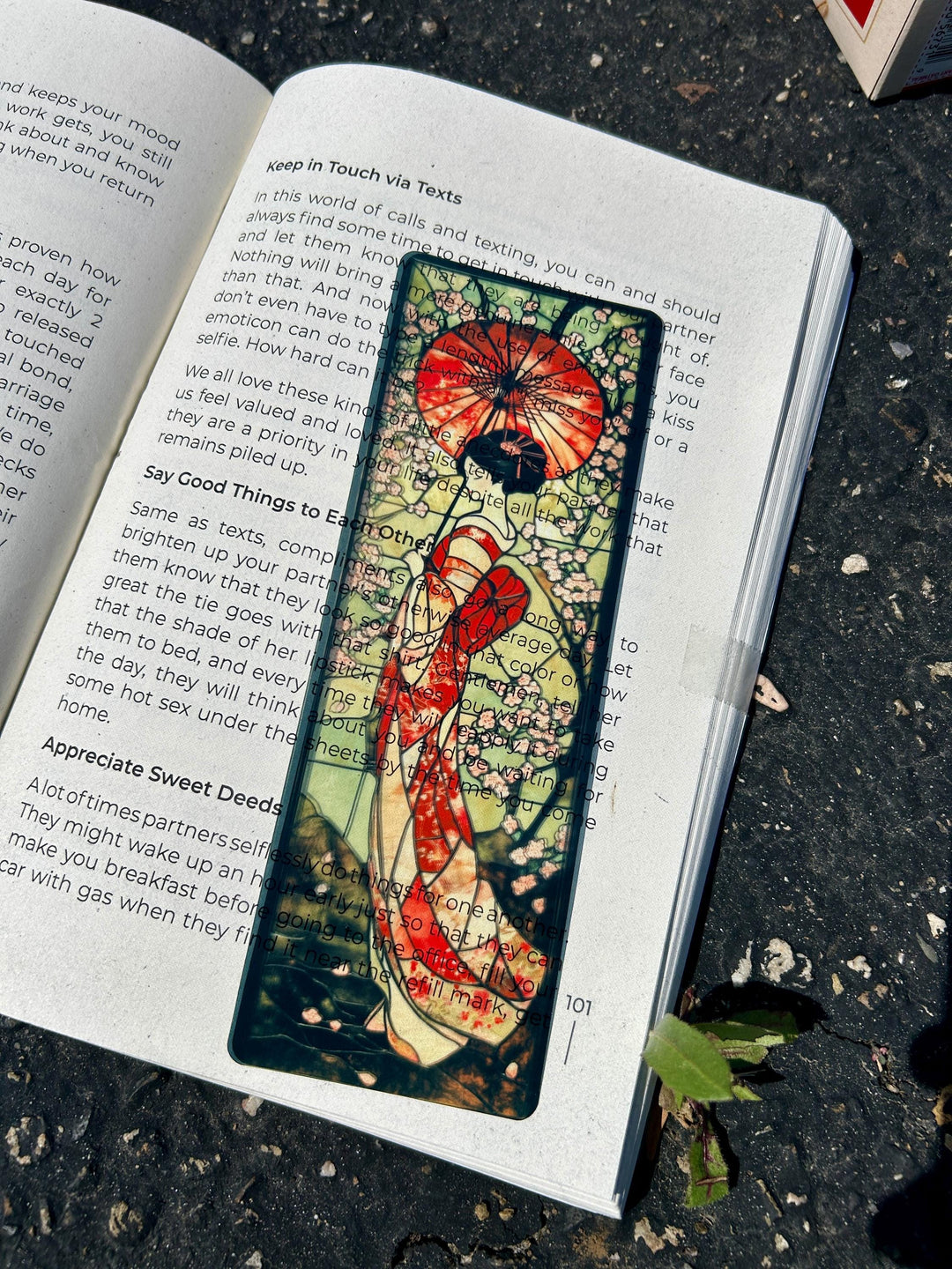 Geisha art bookmark in stained-glass style on open book page