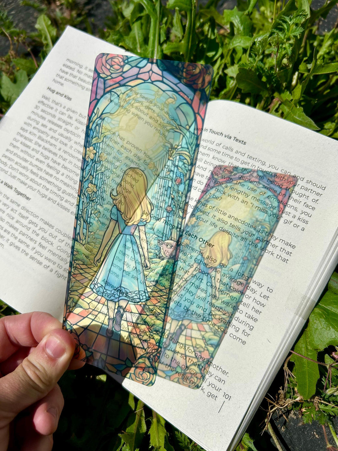 Stained-glass style bookmark showing a girl in a blue dress, rectangular artwork