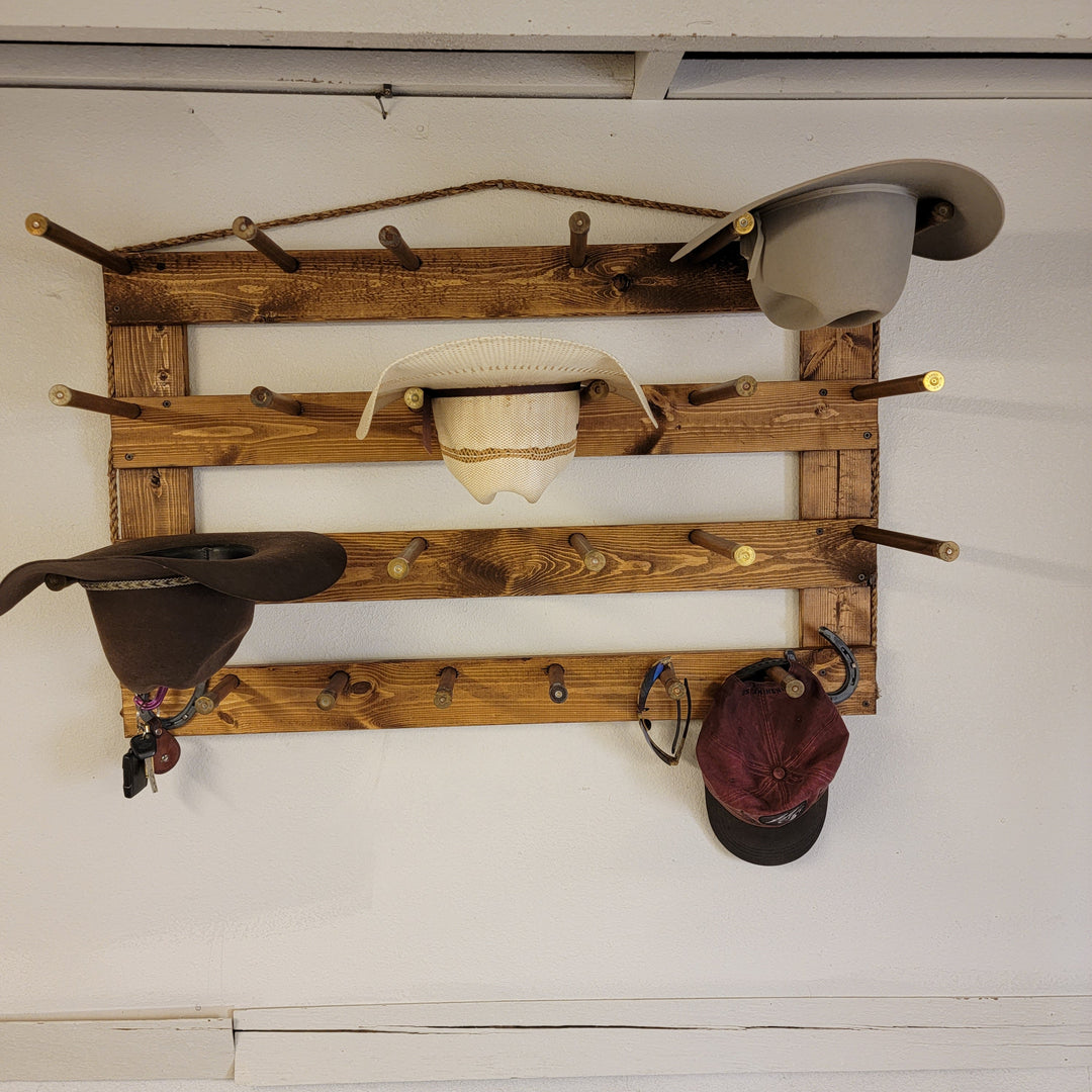 Horizontal wall hat organizer with wooden rack, layered hat shelves, and hanging hooks