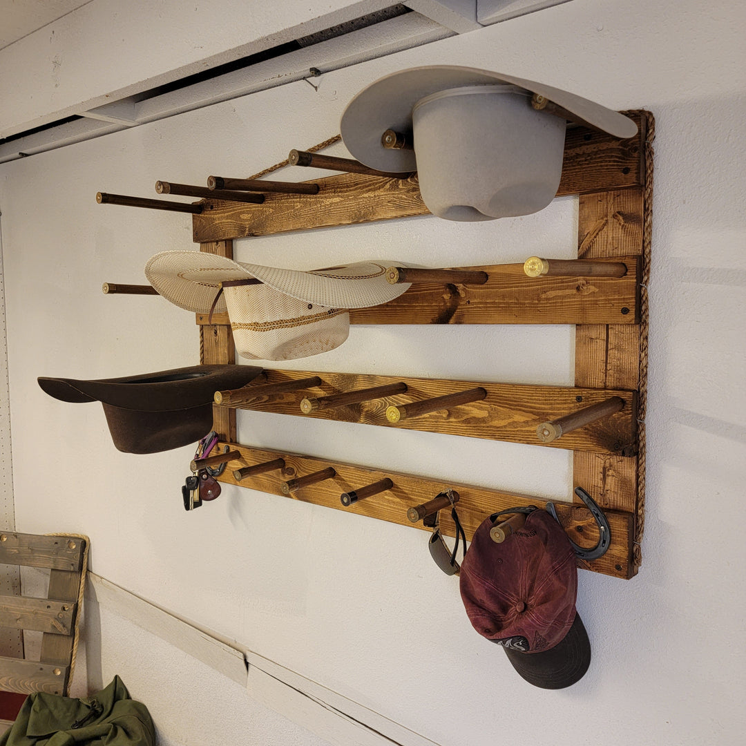 Wall hat organizer with gray and black hat cups plus peg arms and hanging hooks