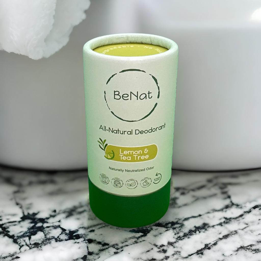 Lemon & tea tree all-natural deodorant stick in paper tube, close-up view