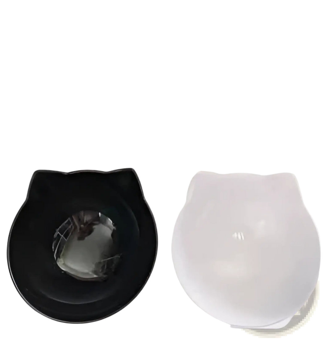 Tilted double cat bowl feeder stand with one black and one white bowl