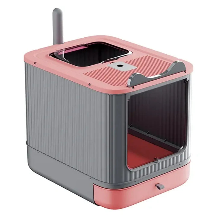 Pink and gray enclosed cat litter box with top entry and front drawer door