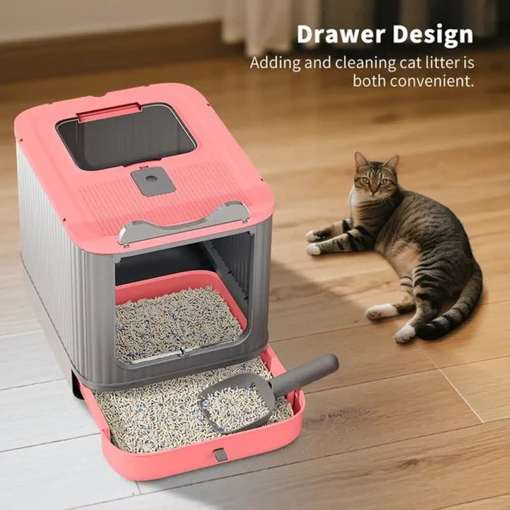 Pink enclosed cat litter box with open drawer and top entry window, side handle