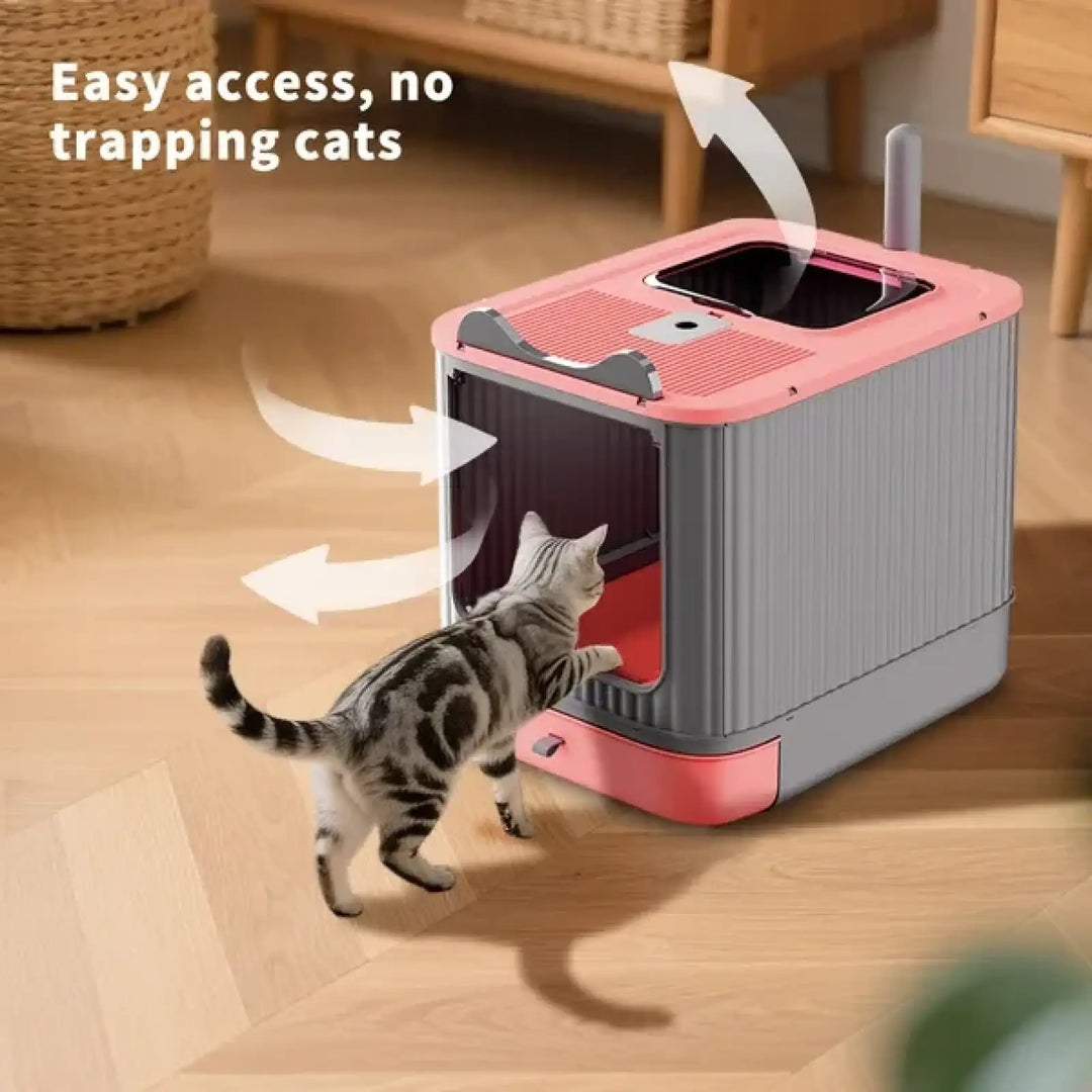 Pink and gray enclosed cat litter box with top entry opening and front access door