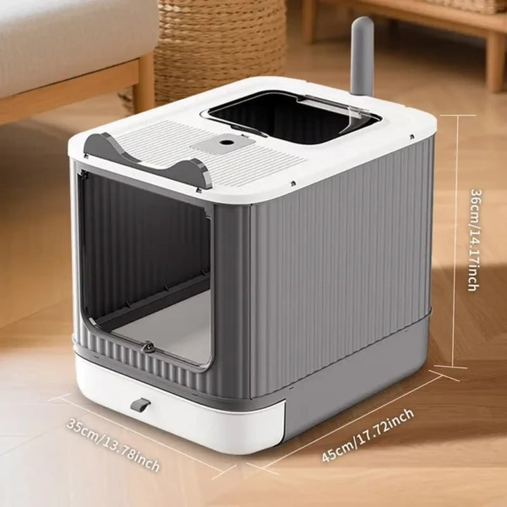 Compact white cat litter box with hinged top hatch and enclosed side entry
