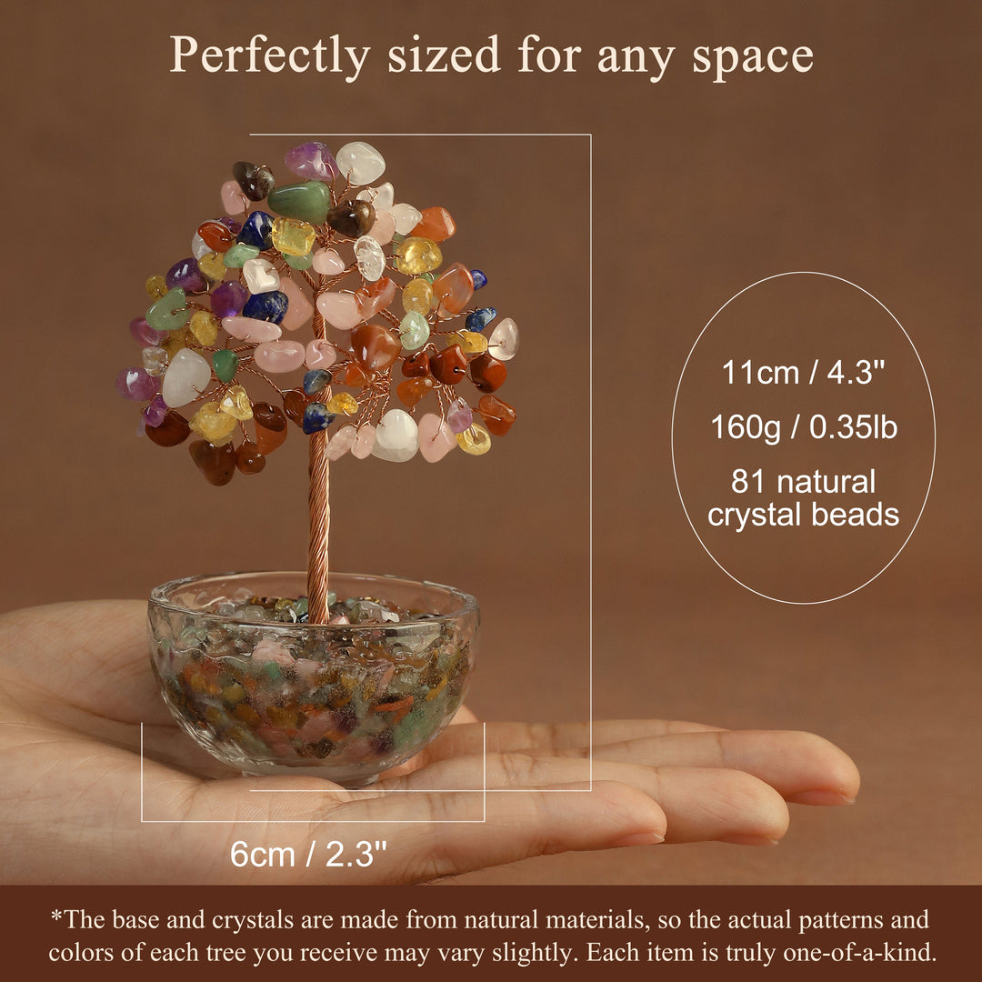 Small crystal gemstone tree with multicolor beaded canopy in clear resin pot, held in hand
