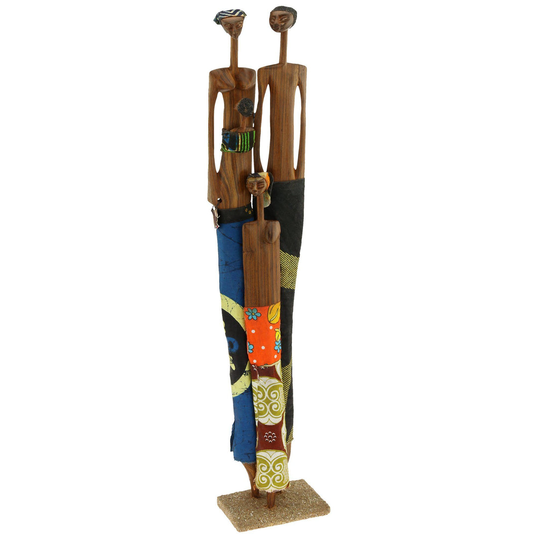 Sandalwood sculpture of two standing figurines with blue, orange, and yellow fabric details