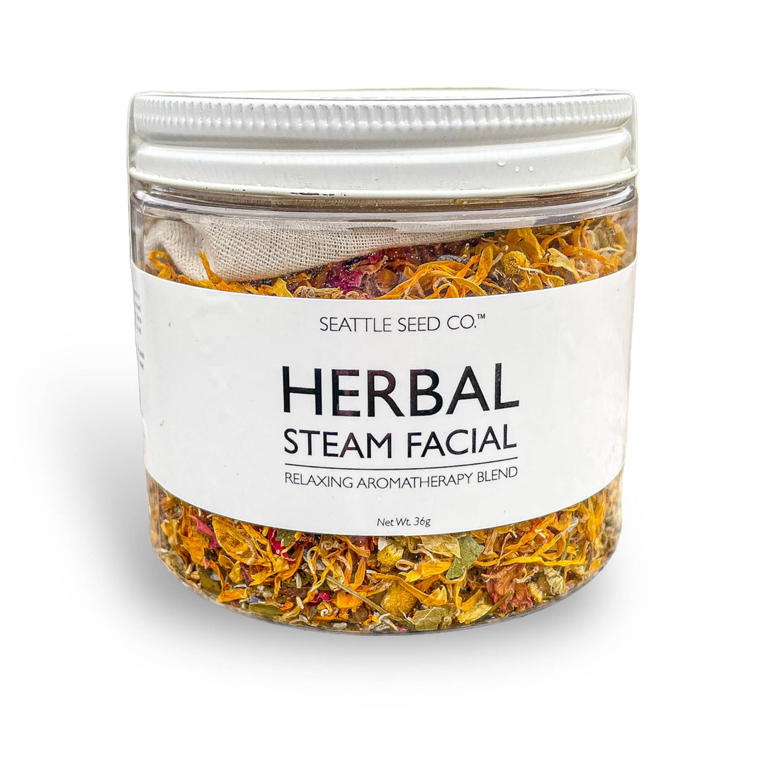 Facial steam blend jar with dried herbal leaves, clear lid and white label