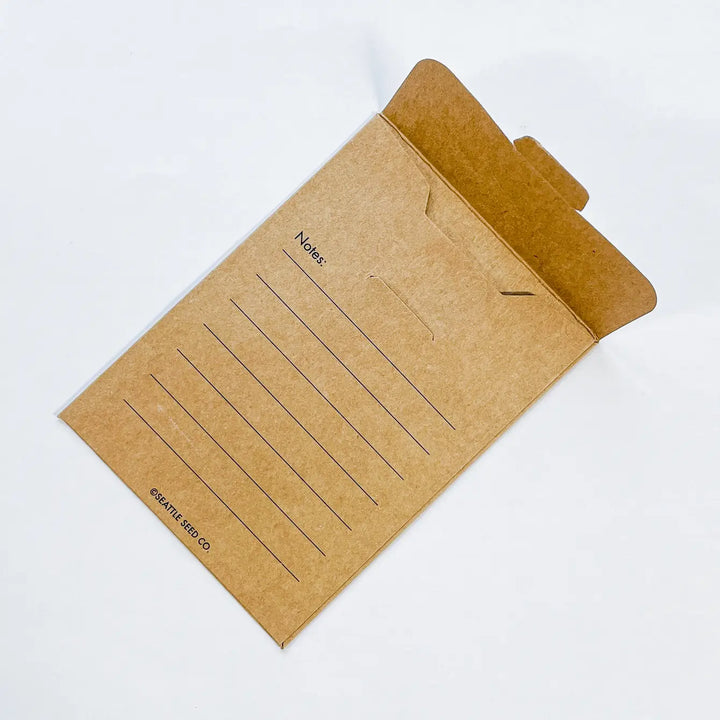 Kraft envelope insert with rows of lines for notes and seed storage flap