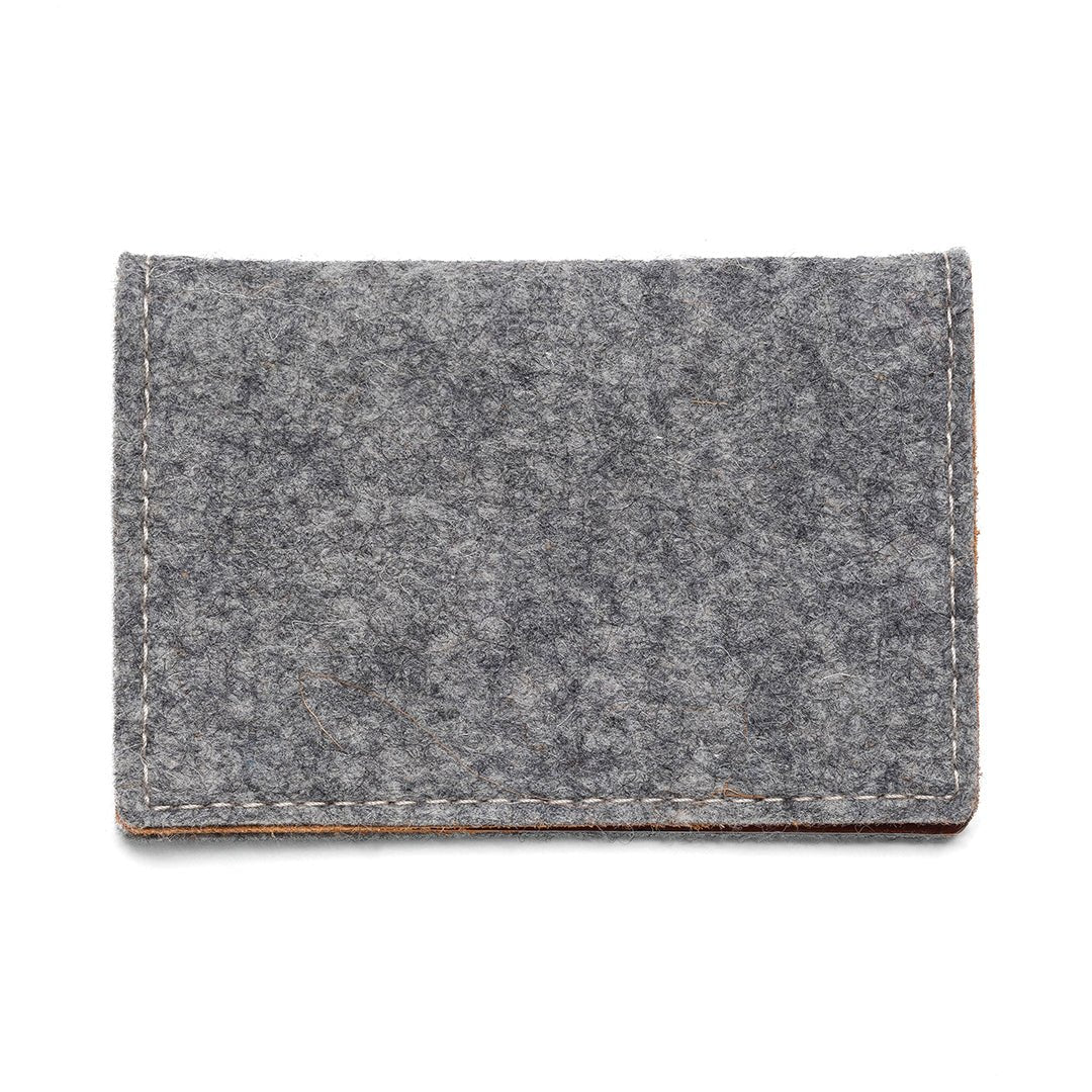 Gray felt bifold wallet with stitched leather trim.