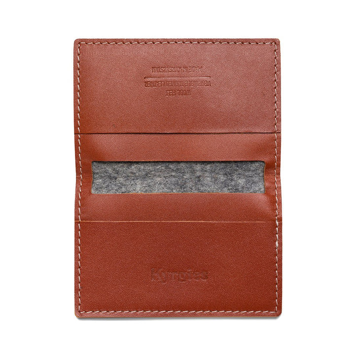 Brown leather bifold wallet with gray felt ID slot and contrast stitching.