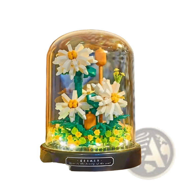 White daisy building block bouquet under clear glass dome on dark base