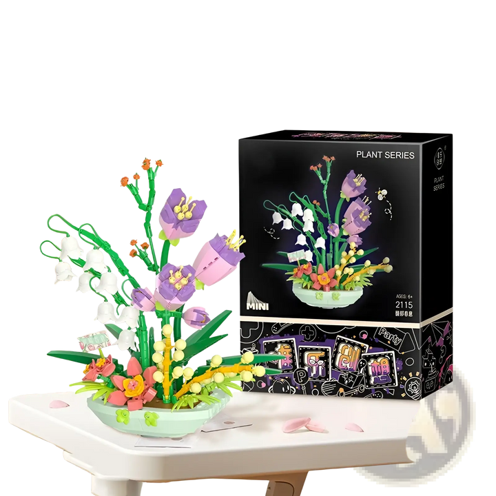 Flower building block set with purple blooms, white blossoms, and green stems in a round tray