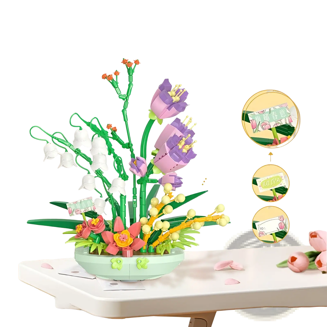 Flower building block set with purple flowers, white blossoms, and green stems on a white tabletop