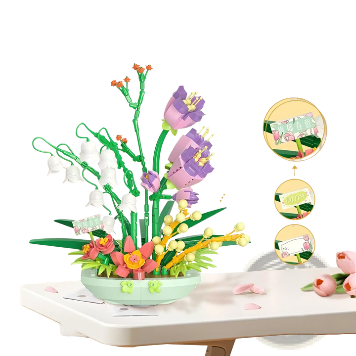 Flower building block set with purple flowers, white blossoms, and green stems on a white tabletop