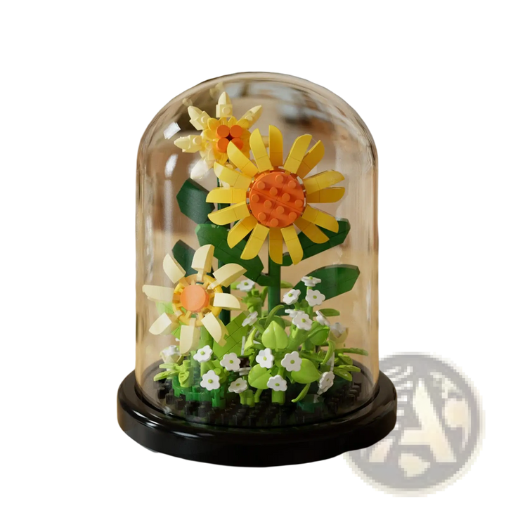 Yellow sunflower and white mini flowers building blocks in a clear glass dome