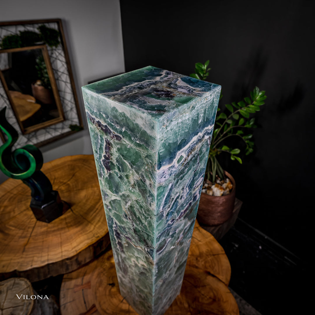 Fluorite floor lamp top and side facets in green translucent stone with purple streaks