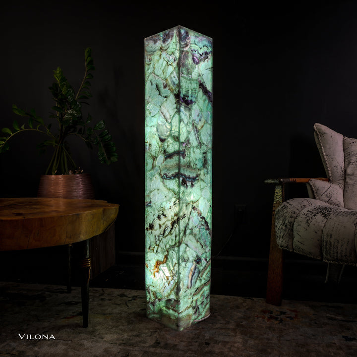 Medium fluorite floor lamp with glowing green square prism and darker purple stone accents
