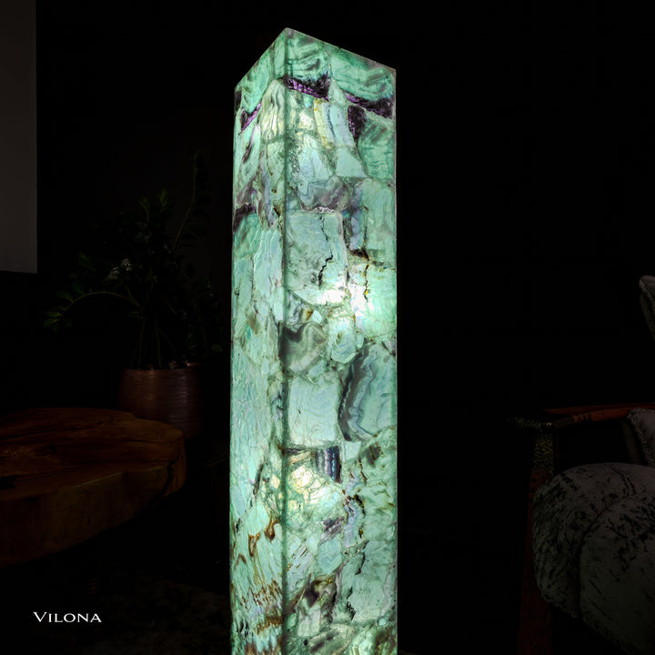 Fluorite floor lamp with tall glowing green square prism and purple-veined top