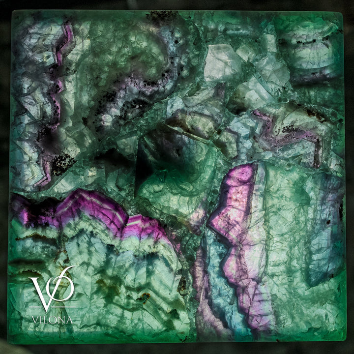 Square fluorite floor lamp close-up texture, green stone with purple crystal inclusions