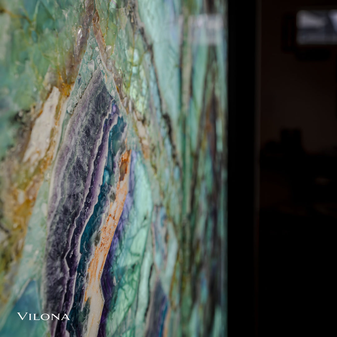 Fluorite crystal wall panel close-up with iridescent turquoise and purple striations