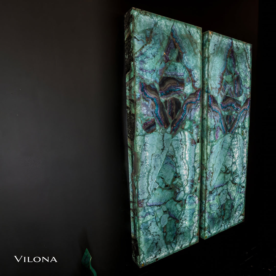 Teal fluorite crystal wall panel pair angled view, showing beveled edges and marbling