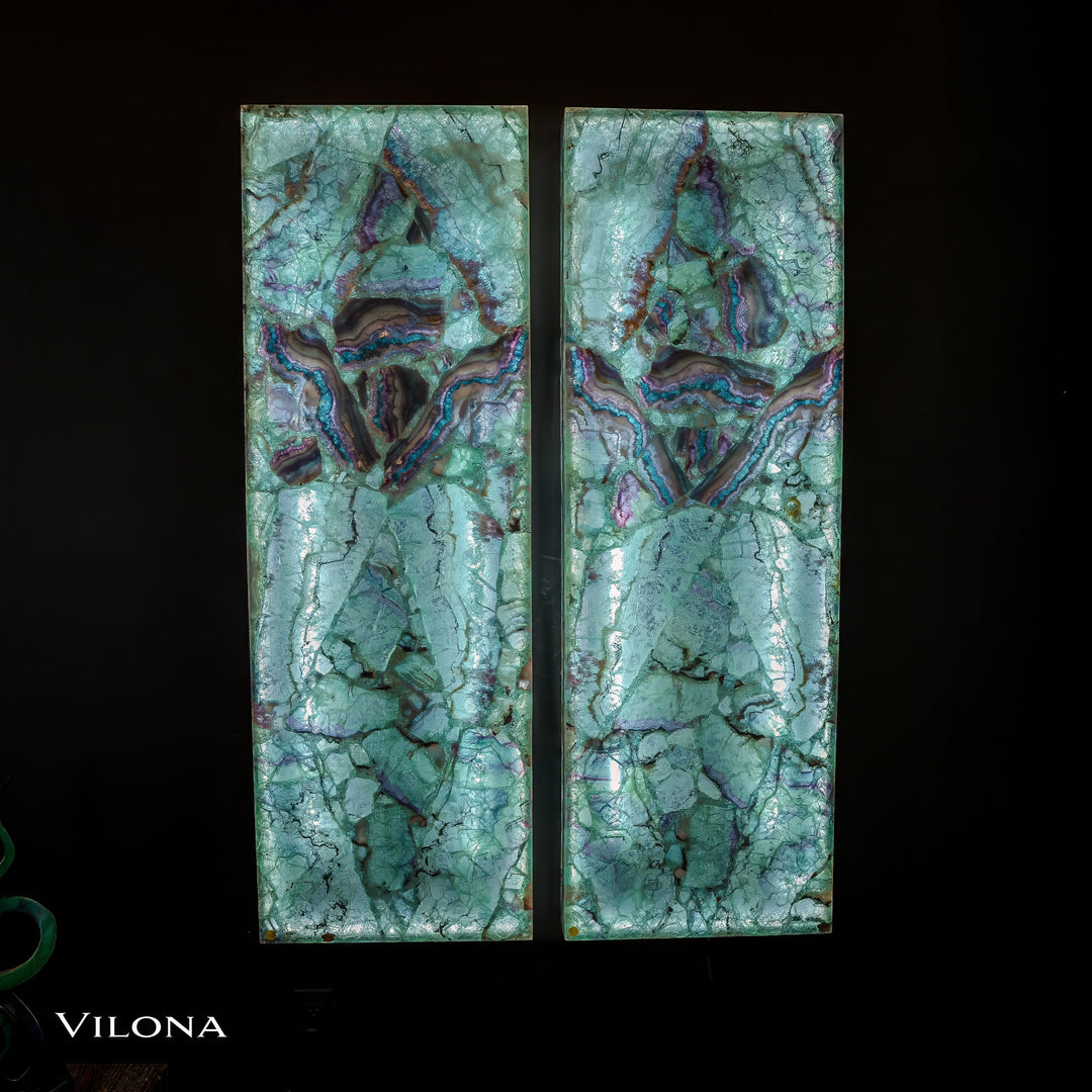Teal fluorite wall panel pair with central blue-violet motif and natural stone lines