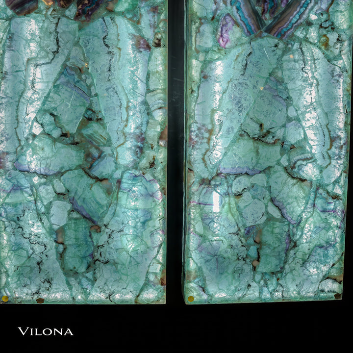 Teal fluorite crystal wall panels with green marbling and iridescent purple-blue accents, vertical