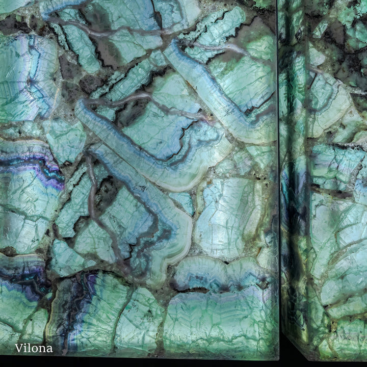 Fluorite wall panel pair with turquoise veined stone and dark broken lines