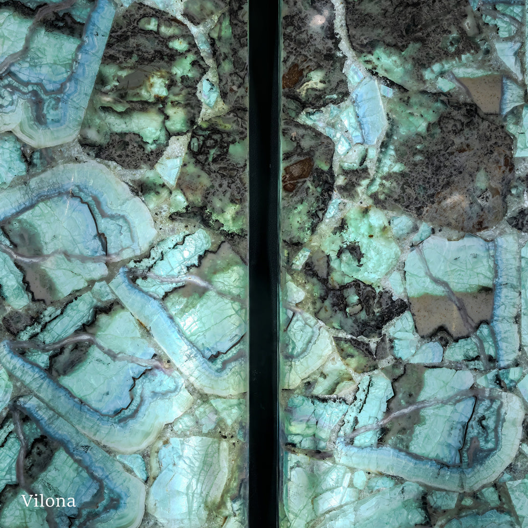 Fluorite crystal wall panel pair close-up with turquoise layers, veins, and dark areas