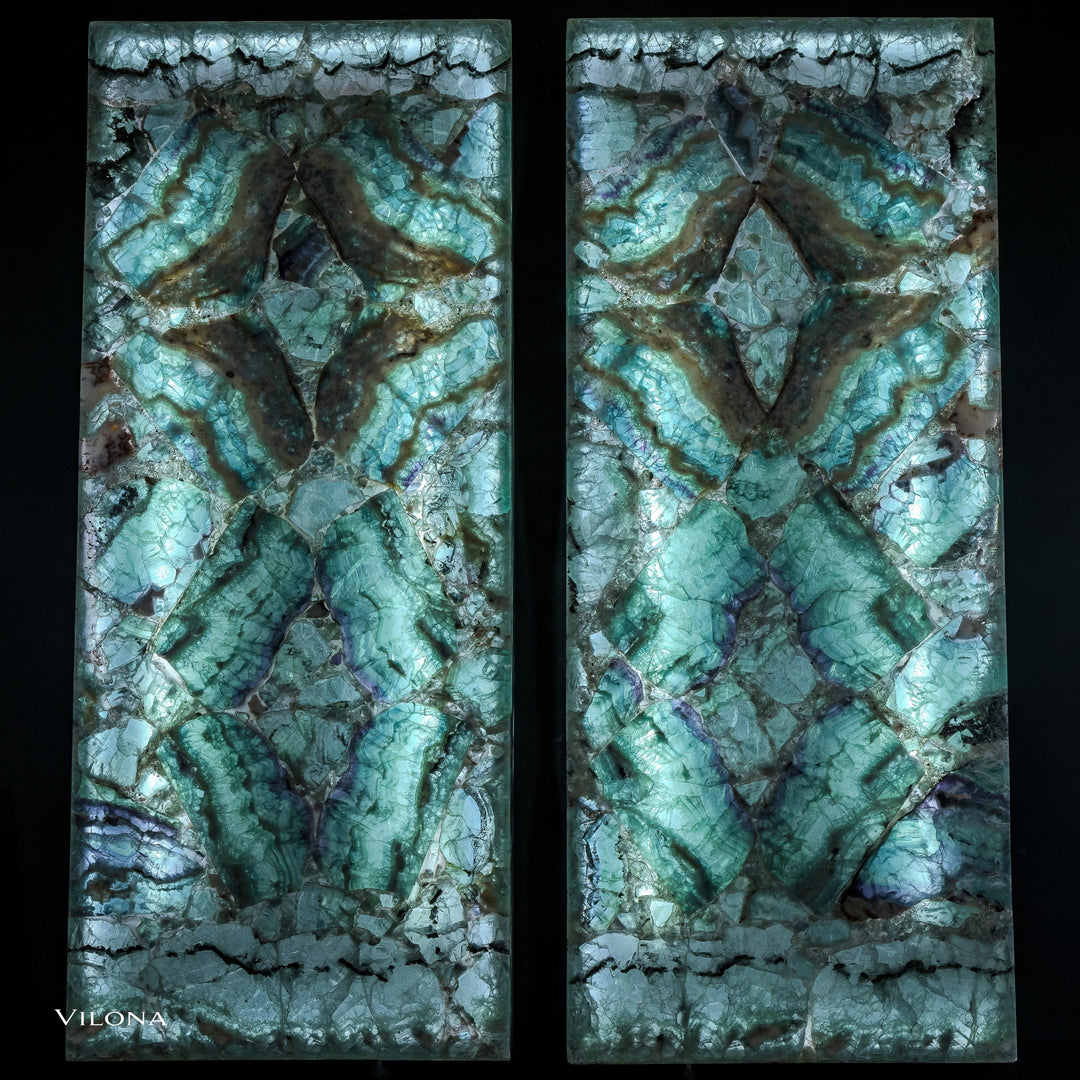 Fluorite crystal wall panels set: two teal stone panels with faceted starburst motifs.