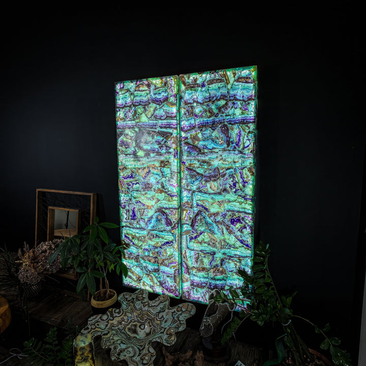 Fluorite crystal wall panel set featuring bright turquoise and violet iridescence on two panels