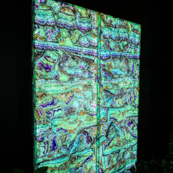 Fluorite crystal wall panel set close view: vivid turquoise, green, and purple iridescent striations