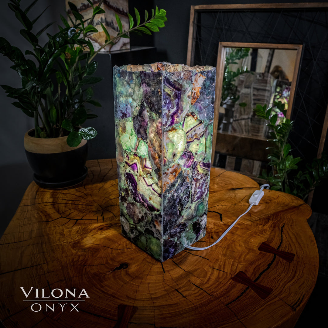 Small fluorite table lamp with multicolor faceted prism shade and white power cord