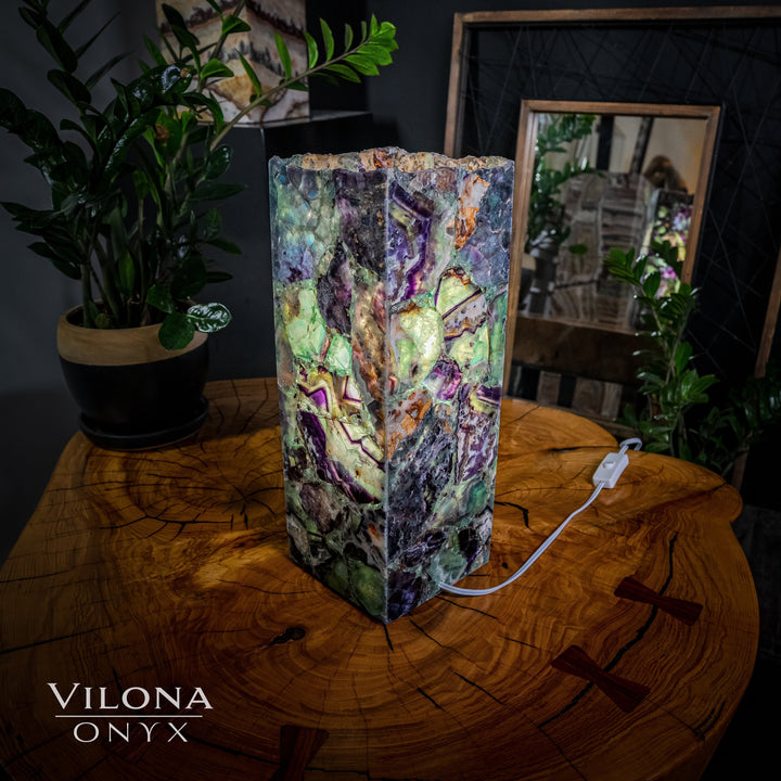 Small fluorite table lamp with multicolor faceted prism shade and white power cord