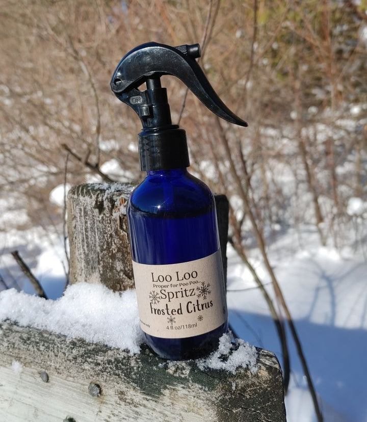 Deodorizing spray bottle, blue glass with black trigger sprayer, Frosted Citrus scent