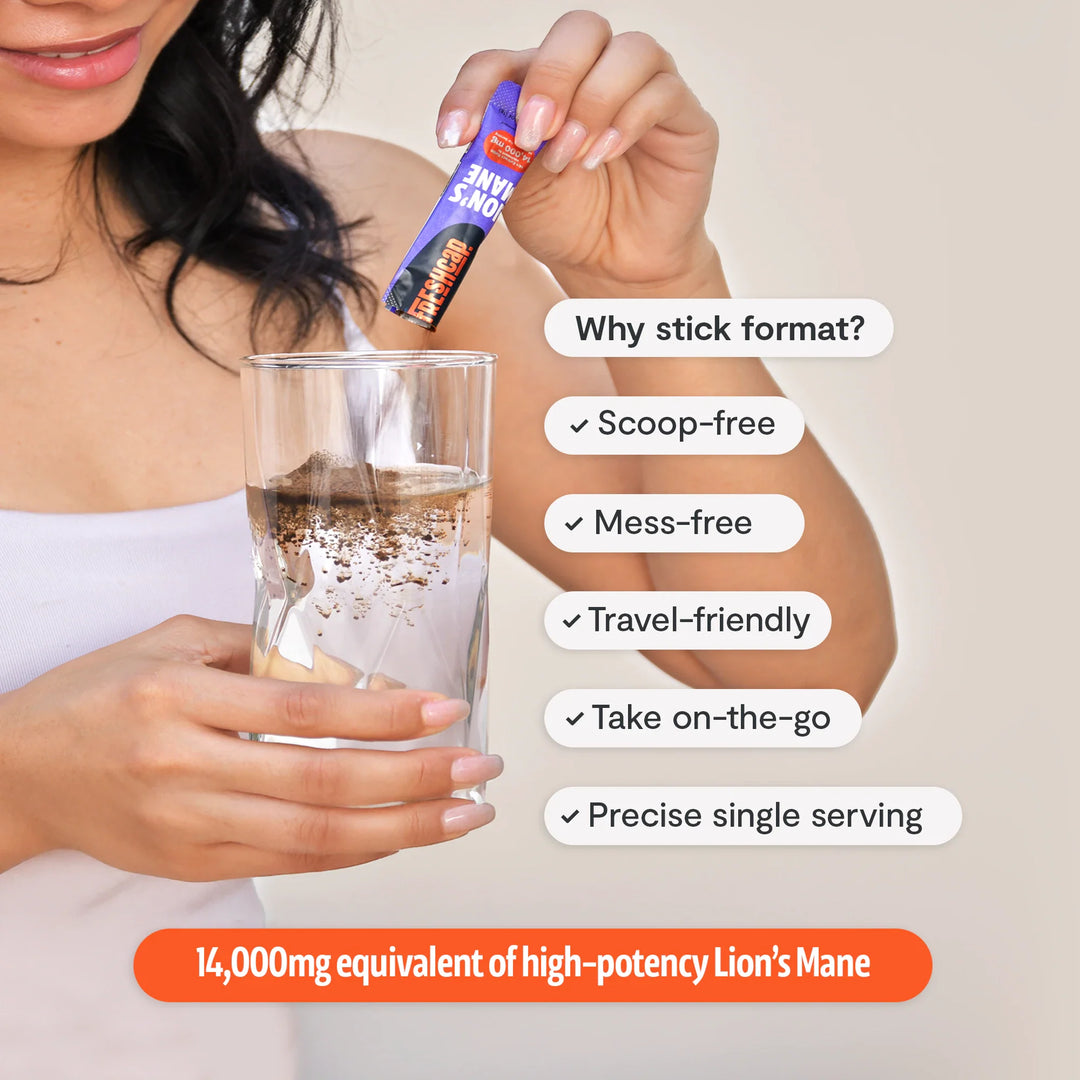 Lion’s Mane mushroom powder stick pack over a glass of water