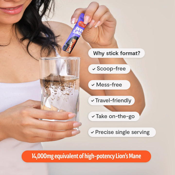 Lion’s Mane mushroom powder stick pack over a glass of water