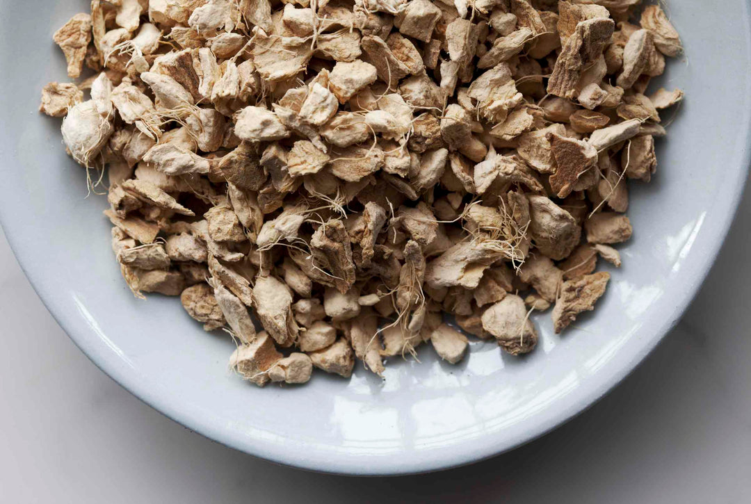 Chopped ginger pieces, light brown dried root chunks