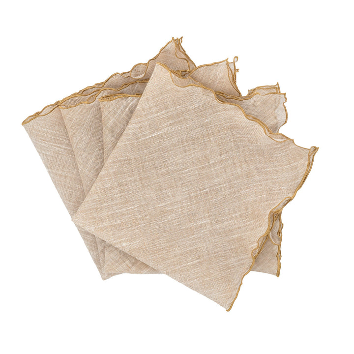 Beige linen napkin set with gold ruffled edges, folded square