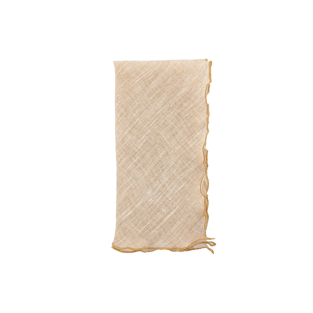 Beige linen napkin with gold ruffled edges, vertical folded view