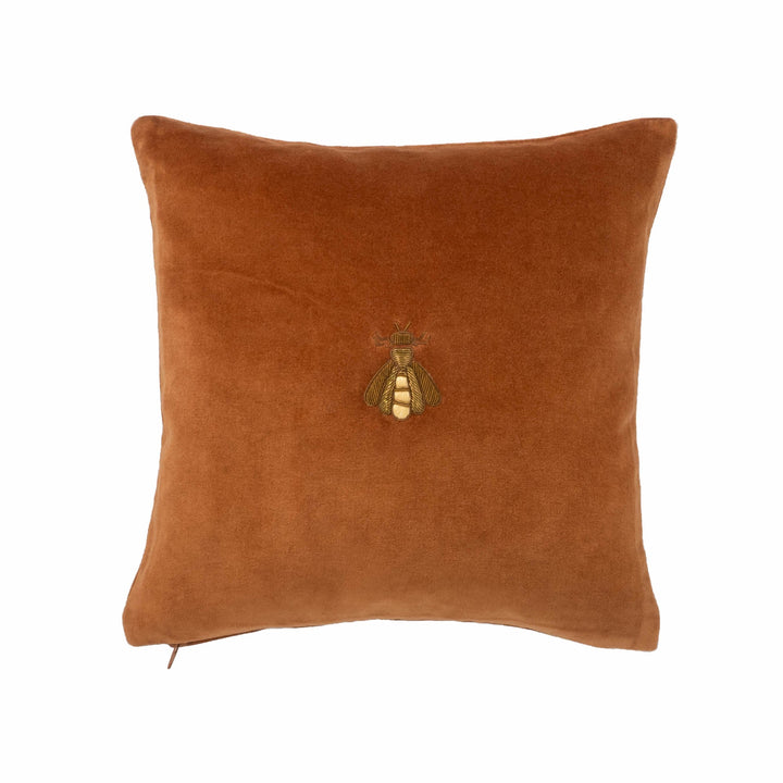 Brown velvet throw pillow with embroidered bee emblem, square 12x12 in
