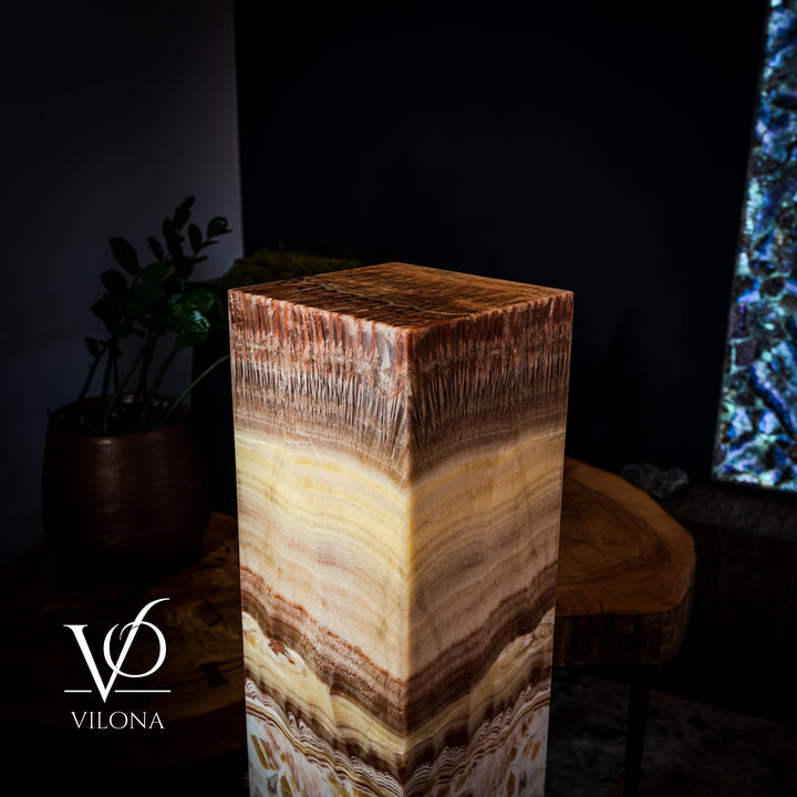 Square onyx-style floor lamp with warm beige, amber, and brown striated shade