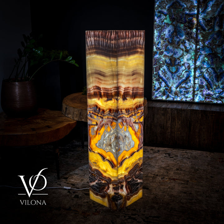 Tall square onyx-style floor lamp with warm yellow, orange, and gray design