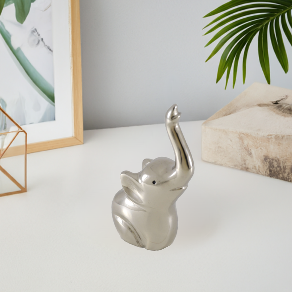 Silver elephant ring holder figurine, front view, raised trunk