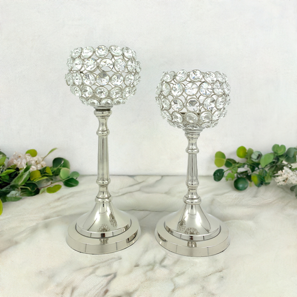 Two silver crystal hurricane candle holders with faceted beaded glass top and base